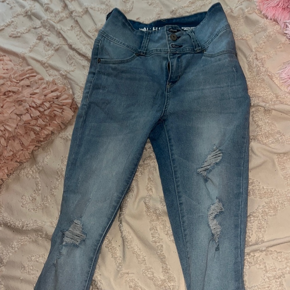 light blue ripped jeans
